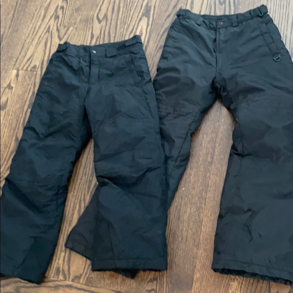 A group of 2 ski pants